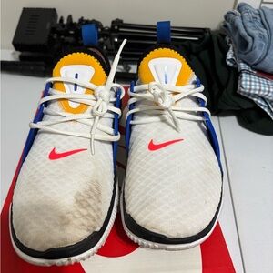 Nike men’s White and Blue Sneakers with Red Swoosh